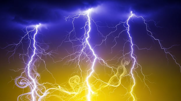 Lightning bolt over the sky with yellow and blue lightning photo