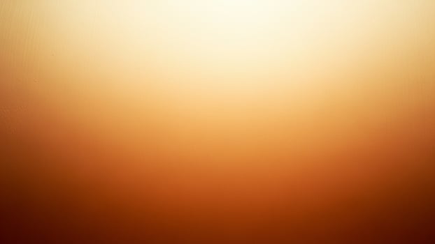 A blurry image of a plane flying over a dark background photo