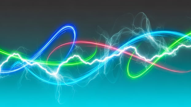 Colorful waves of energy on a blue background photo