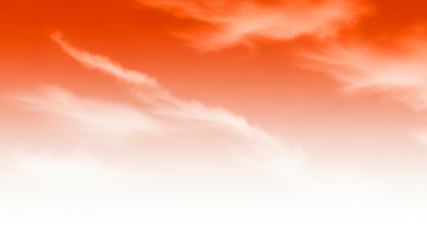 A red and white sky with clouds photo