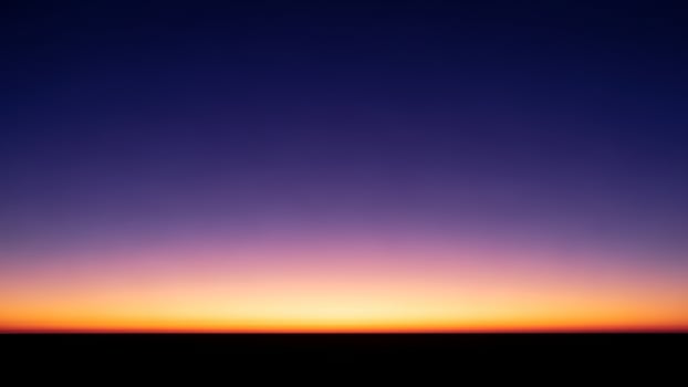 A sunset over the horizon with a purple and blue sky photo