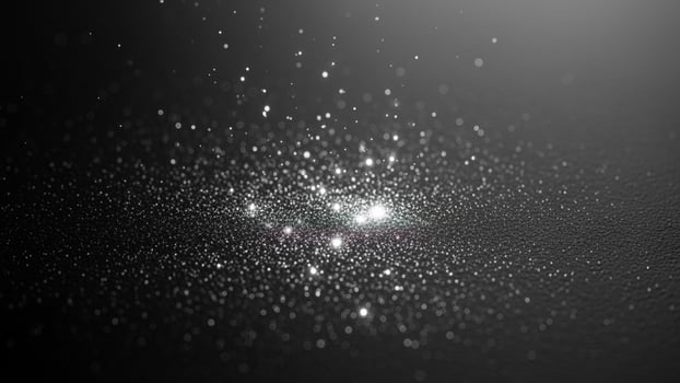A black and white image of a star with a sparkle photo