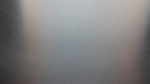 A metal surface with a white background photo