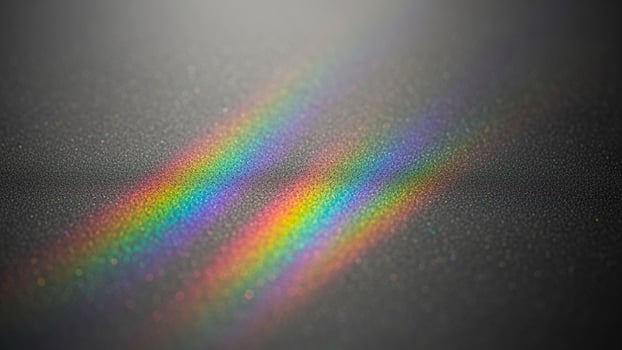 Rainbow light on a black surface with a rainbow effect photo