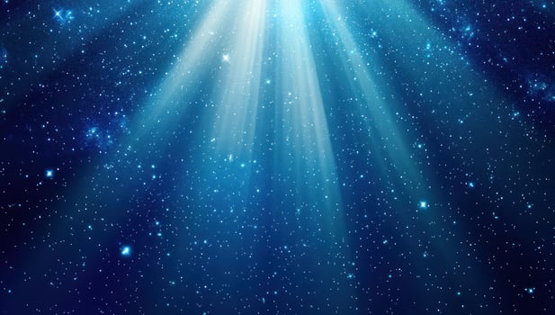 Abstract blue light beams with sparkling dots background photo