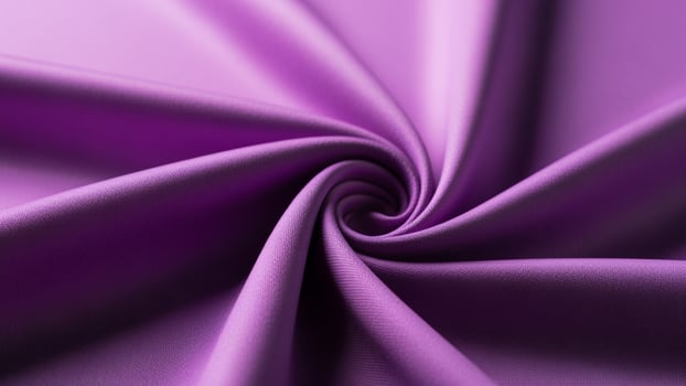 Purple fabric with a spiral pattern photo