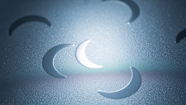 A close up of a moon with a crescent shape photo
