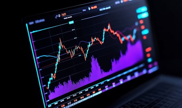 Stock market analysis chart on laptop display financial data and investment trends photo