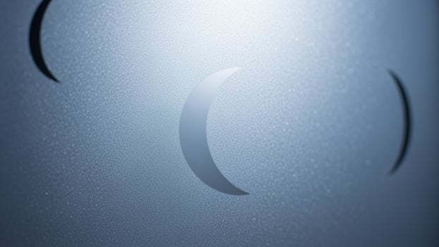 A close up of a metal door with a moon on it photo
