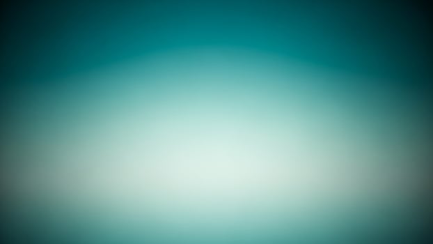 A blurry image of a blue light in the dark photo