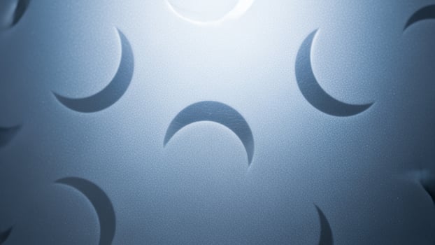 A close up of a metal surface with a pattern of circles photo