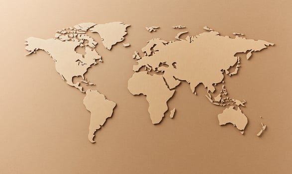 Simple beige world map design on flat surface depicting global cartography photo
