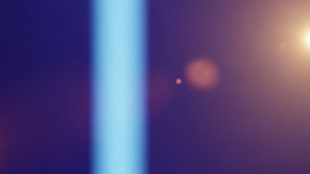 A blue light is shining through a blue light pole photo