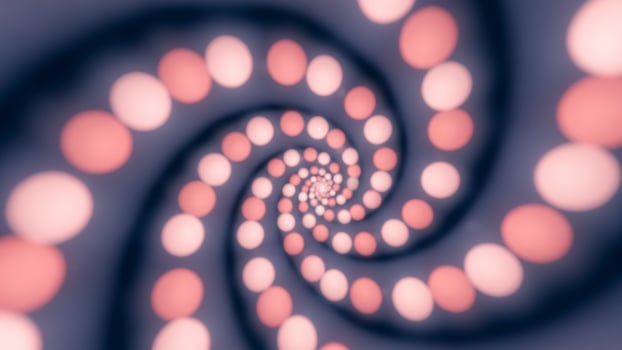 A spiral of pink circles is shown in this image photo