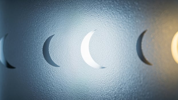 A close up of four different moon phases photo