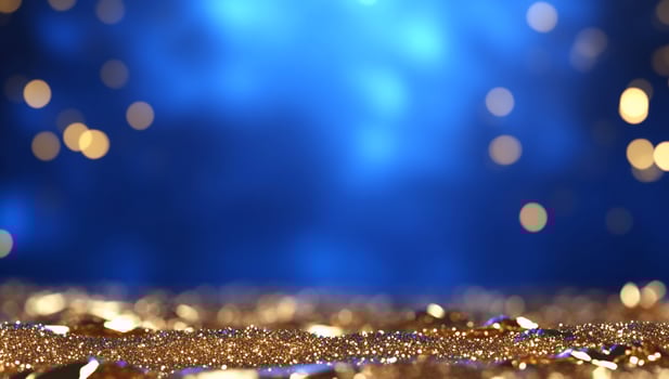 Sparkling blue and gold glitter festive background photo
