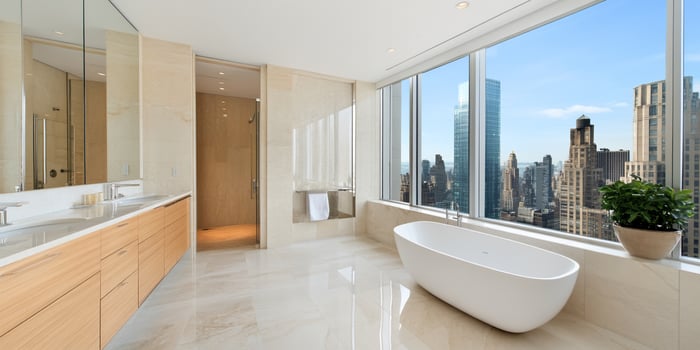 Upscale bathroom interior with city view freestanding tub architecture photo
