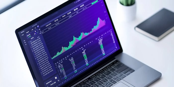 Financial graph displayed on laptop for business analysis and market trends photo