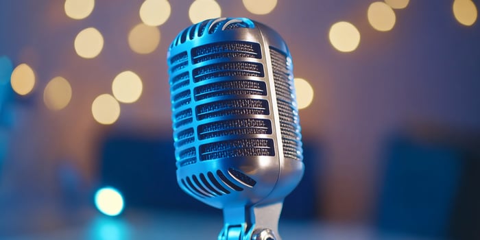 Vintage microphone on bokeh background for studio recording or performance photo