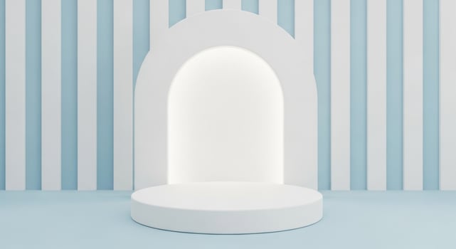 A white chair in front of a blue wall photo