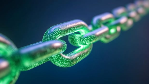 Metallic chain link with glowing green illumination connecting cybersecurity photo