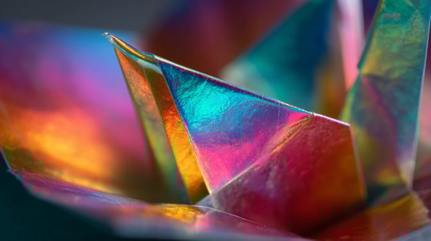 Iridescent origami paper macro photography showcasing vibrant colors and textures close up view photo