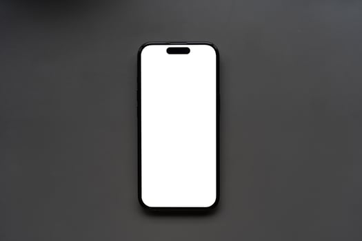 Modern Smartphone with Blank White Screen on a gray background. for showcasing mobile app designs, website layouts, or any digital content. The blank screen offers a versatile canvas for designers. photo