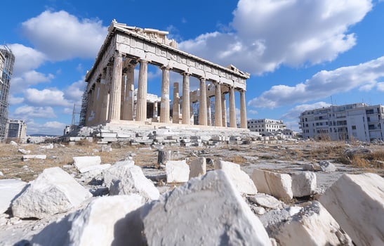 Ancient stone building with columns ruins on sunny day historical landmark architecture photo