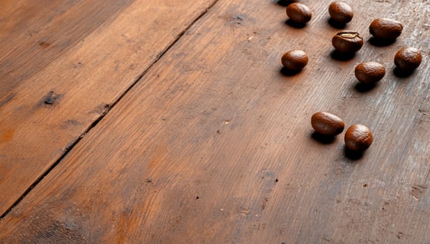 Coffee beans on rustic wood surface overhead flat lay composition photo