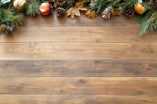 Rustic wood background with pine cones and autumn leaves overhead photo