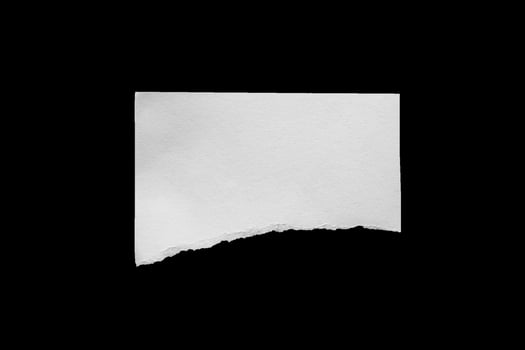 A piece of paper with a hole in it photo