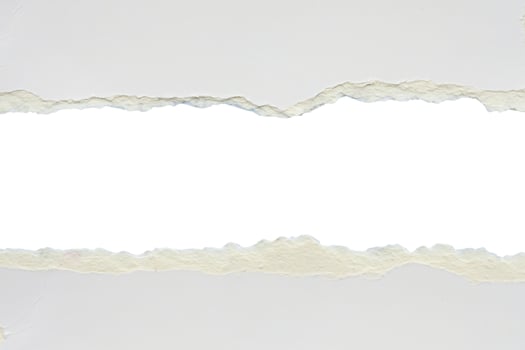 A hole in the paper with a white background photo