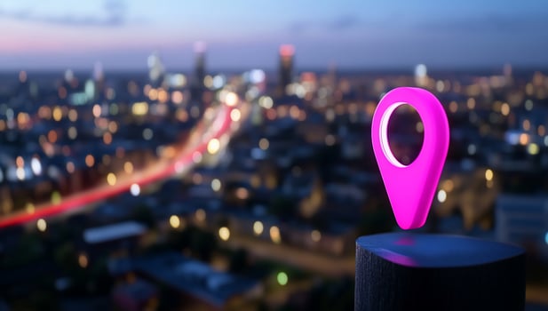 Vibrant location marker on cityscape at dusk travel and navigation concept photo