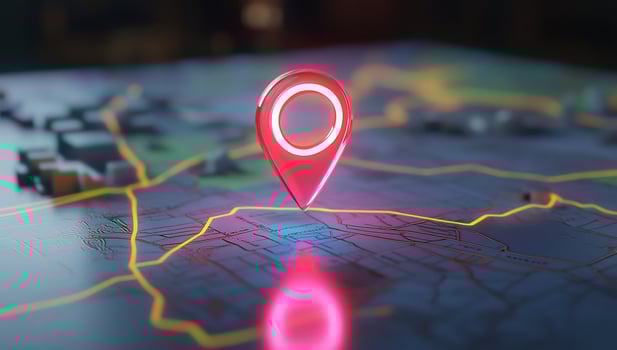 Red map pinpoint hovering over stylized digital map representing travel navigation photo