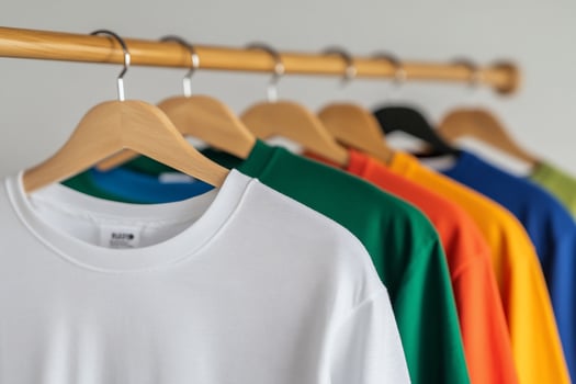 Colorful shirts on a rack apparel fashion clothing display photo