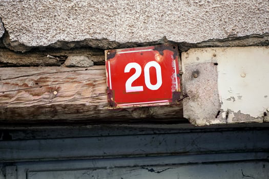 House number 20 on red metal plate enameled photo