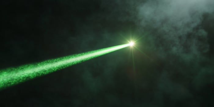 Green light beam abstract technological background photo