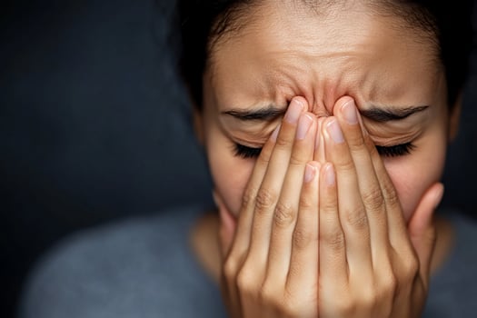 Person expressing emotional distress and mental health concern photo