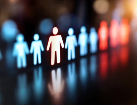 Stylized human figures representing business and leadership photo