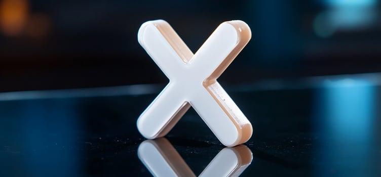 White plus sign cross symbol on reflective surface minimalist design photo