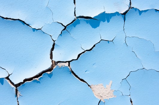 Cracked blue paint surface texture abstract pattern background photo