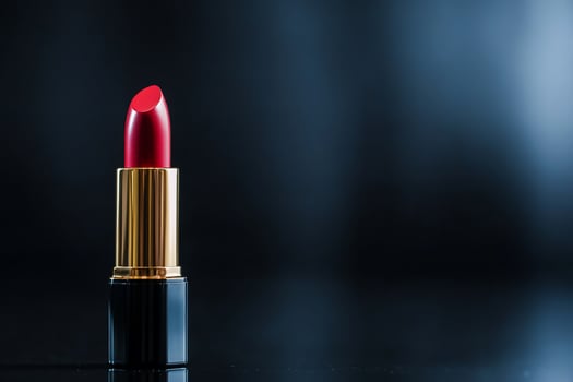 Elegant red lipstick product shot with copy space for cosmetics advertising and beauty blogs photo