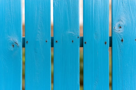 Light blue painted wood fence texture background photo