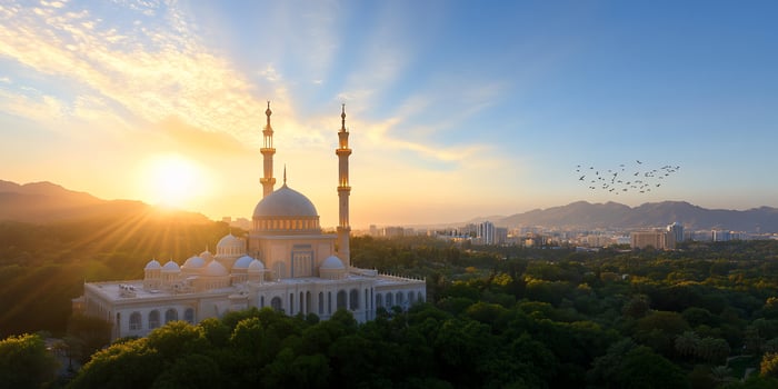 Place of worship at sunrise with birds and cityscape background photo