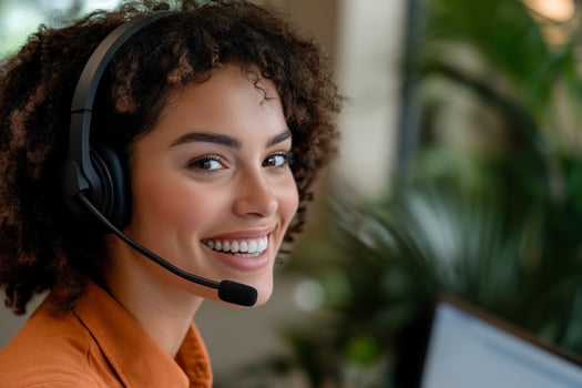 Smiling professional wearing headset for customer support services photo