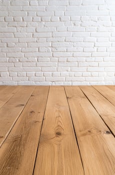 White brick wall with wooden floor background for interior design and mockups photo