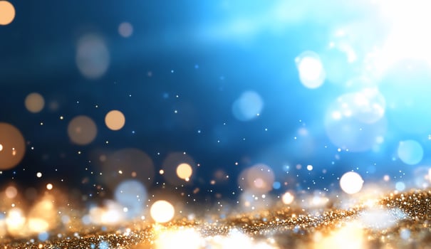 Abstract glitter sparkle background with gold and white particles bokeh photo