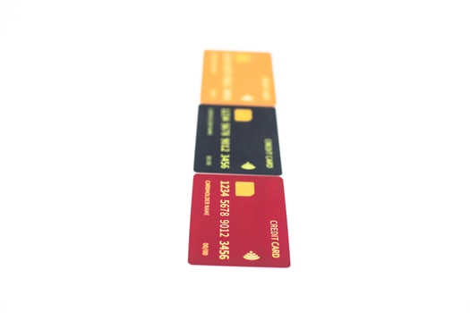 Stack of Colorful Credit Cards on White Background for Financial Concepts and E-commerce photo