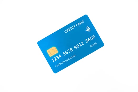 A clean, crisp, and isolated close up of a blue credit card on a bright white background photo