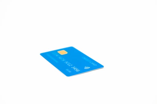 Isolated blue credit card with generic numbers offers a sleek and modern financial visual photo